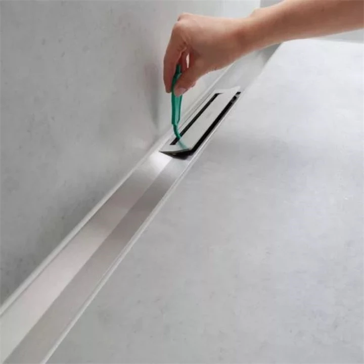 Hansgrohe RainDrain Flex oldalfal mellé zuhanylefolyó 100 cm, vágható, polírozott arany hatású 56053990