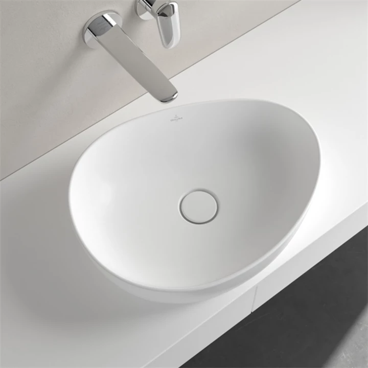 Villeroy and Boch Antao ráültethető mosdó Aszimmetrikus, fali vagy magasított csaptelephez, 510 x 400, Stone White 4A735 Villeroy and Boch Antao ráültethető mosdó Aszimmetrikus, fali vagy magasított csaptelephez, 510 x 400, Stone White 4A735